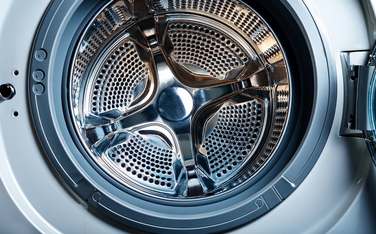 A mosógép dobján lévő vízkő egy perc alatt eltűnik: egy zoknira és citrusfélékre van szüksége. A mosógép dobján lévő vízkő egy perc alatt eltűnik: egy zokni és egy citrusféle kell hozzá